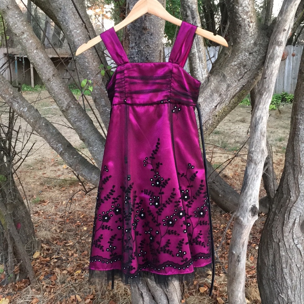Magenta children’s dress with black lace